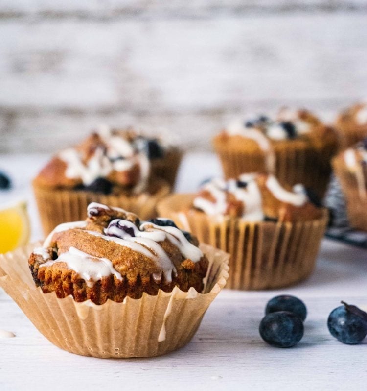 These Healthy Blueberry Lemon Muffins are the best breakfast option to make ahead, grab on the go for a busy morning. This easy muffin recipe is not only paleo, gluten free, but also has the most fluffy, soft and moist texture. Healthy blueberry lemon muffins for a family to enjoy, even your little picky kids eaters. | #Shuangyskitchensink #blueberrymuffin #muffinrecipe #paleo #healthybreakfast #breakfastmuffins #blueberrylemon #glutenfree #glutenfreerecipe