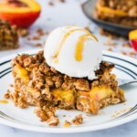 Peach Crisp Crumble Bars| Looking for the perfect summer peach dessert? The buttery crumbly crust and perfect crisp layered with sweet juicy fresh summer peaches fillings, these Peach Crisp Crumble Bars are the perfect sweet dessert for this summer. It is also gluten free, vegan and refined sugar free. |#crumblebars #peachdessert #glutenfreedessert #healthydessert #easydessert #healthyrecipes #vegandessert#veganrecipes