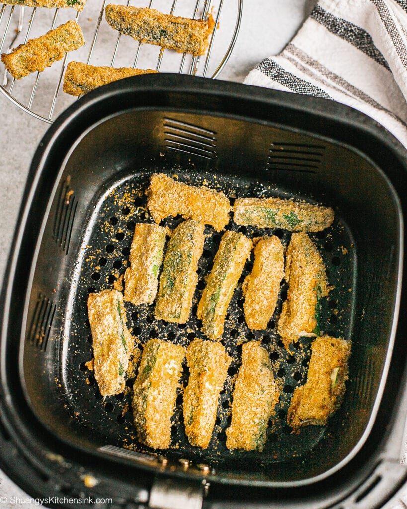 Veggies are being fried in an air fryer for a healthy alternative to french fries 