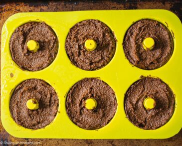 Chocolate donut batter filled silicone donut pan.