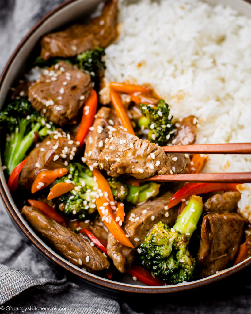 Chopsticks used to show the beef in the stirfry