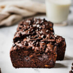 Five slices of gluten-free banana bread full of dark chocolate