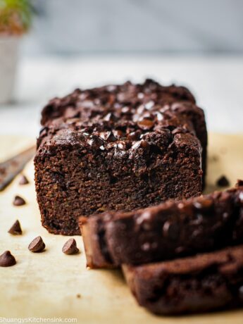 A few slices of Chocolate Zucchini Loaf that is soft and moist. This healthy Chocolate Zucchini Bread with chocolate chips are so delicious.