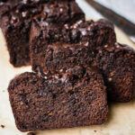 A few slices of Chocolate Zucchini Loaf that is soft and moist. This healthy Chocolate Zucchini Bread with chocolate chips are so delicious.