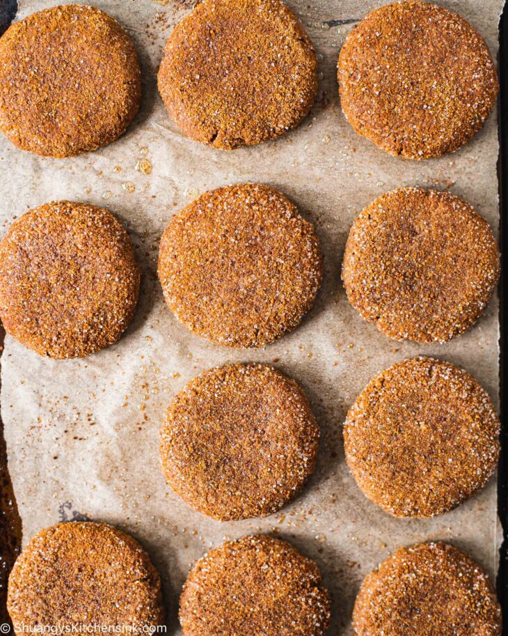 Instruction to make apple butter cookies: Roll each cookie dough ball in the apple pie spice sugar mixture until lightly coated.