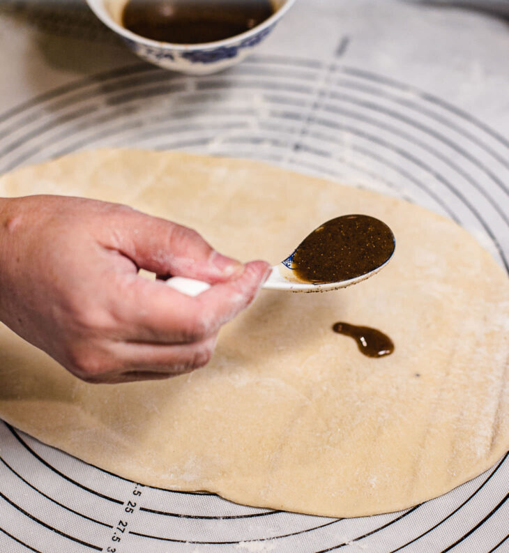 Spread about ~1 tablespoon of the filling evenly over the surface.