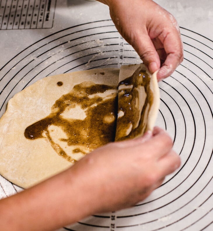 Spread about ~1 tablespoon of the filling evenly over the surface.
