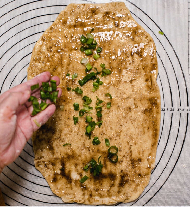 Sprinkle generously with chopped scallions.