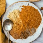 a plate full of spices mixed together