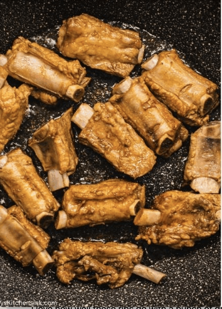 Step by step instruction to make sweet and sour ribs - Heat oil in a large wok or pan until it's shimmering. Add the ribs to the hot oil and fry them until they are golden brown on all sides.
