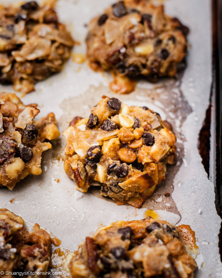 a tray filled with freshly baked healthy treats. They are packed with sugar free chocolate and gluten free nuts