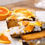 a sweet and gluten free cake is slices in thick slices and topped with an easy frosting