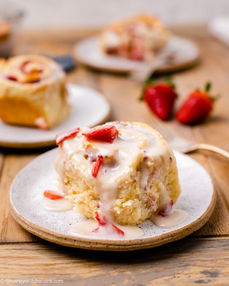 a plated soft and delicious strawberry roll