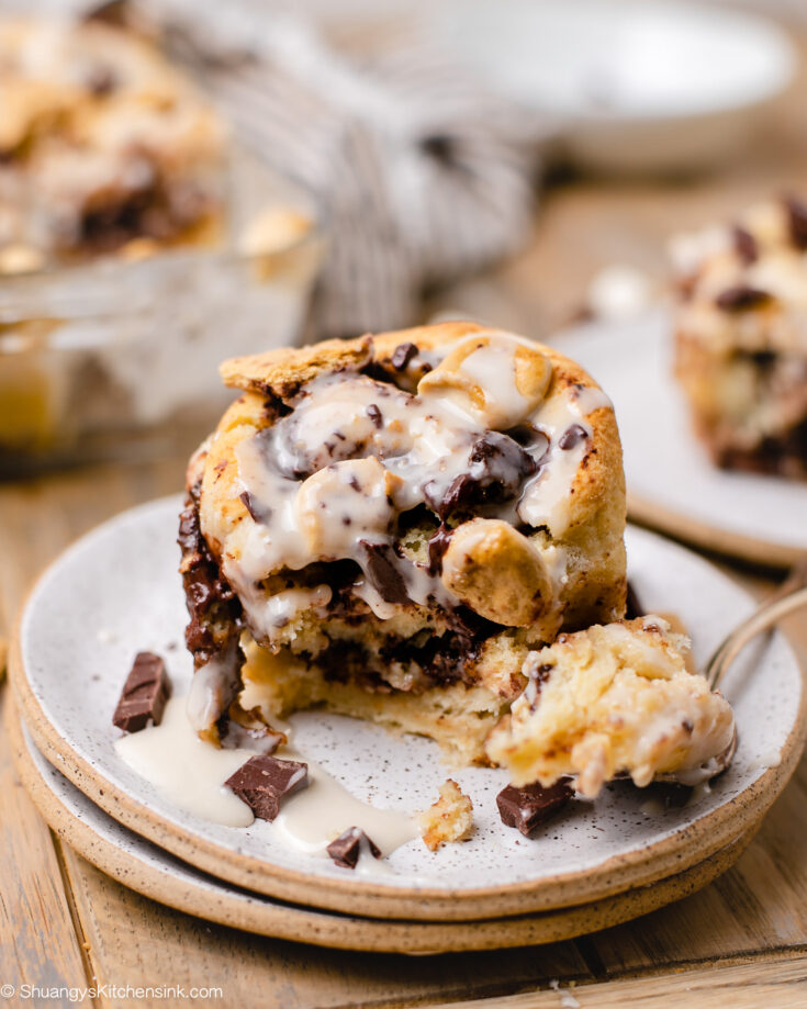 Freshly made homemade s’mores baked dessert on a plate with vegan coconut simple icing