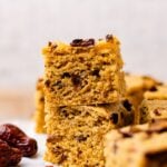 Jujube dates are filled in the delicious corn flour sponge cake which is stacked on parchment paper