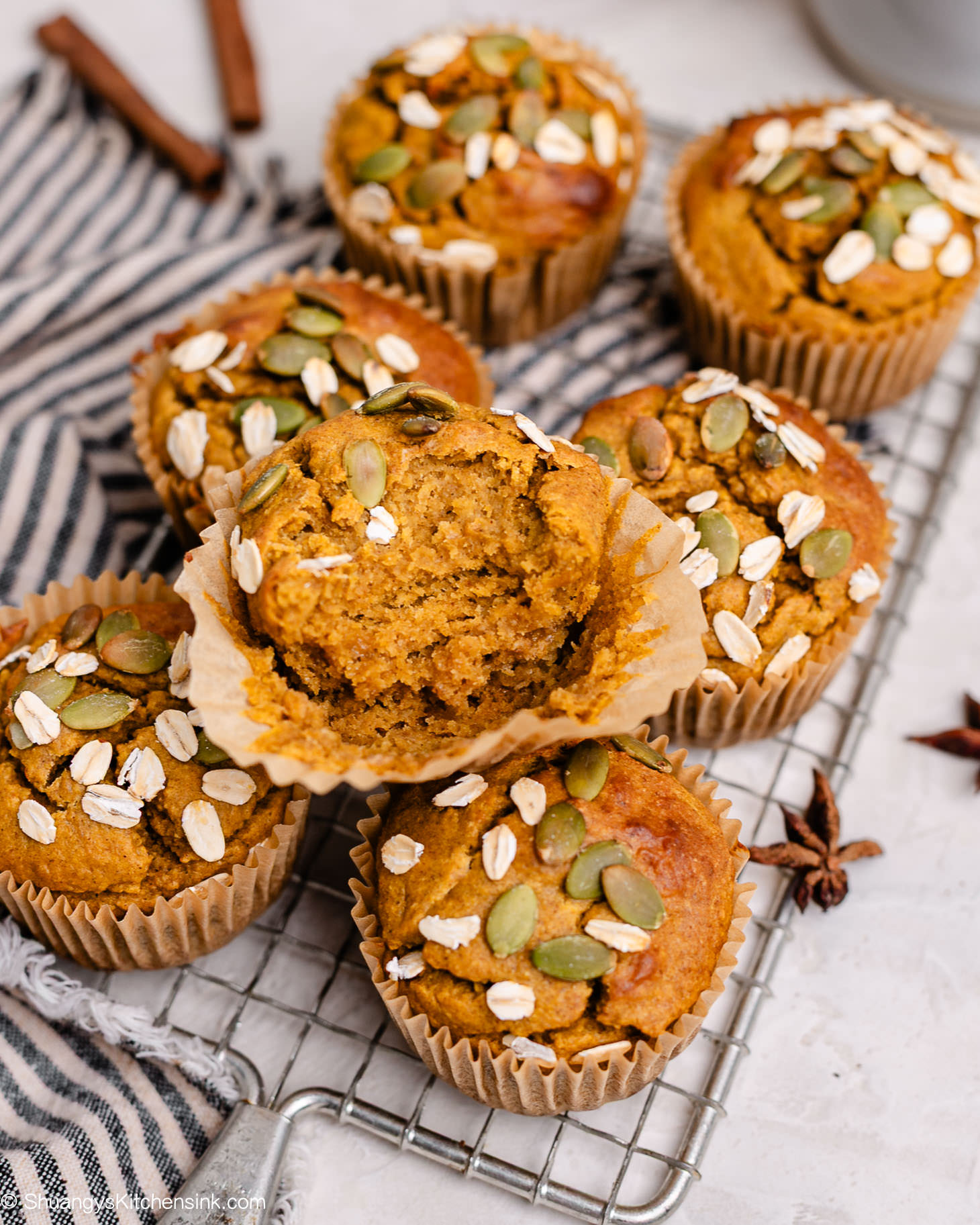 Close-up of pumpkin muffin cut in half showing soft texture inside