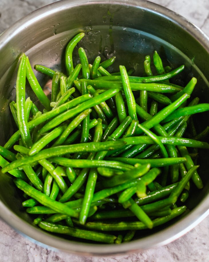 Drain the green beans and set aside.