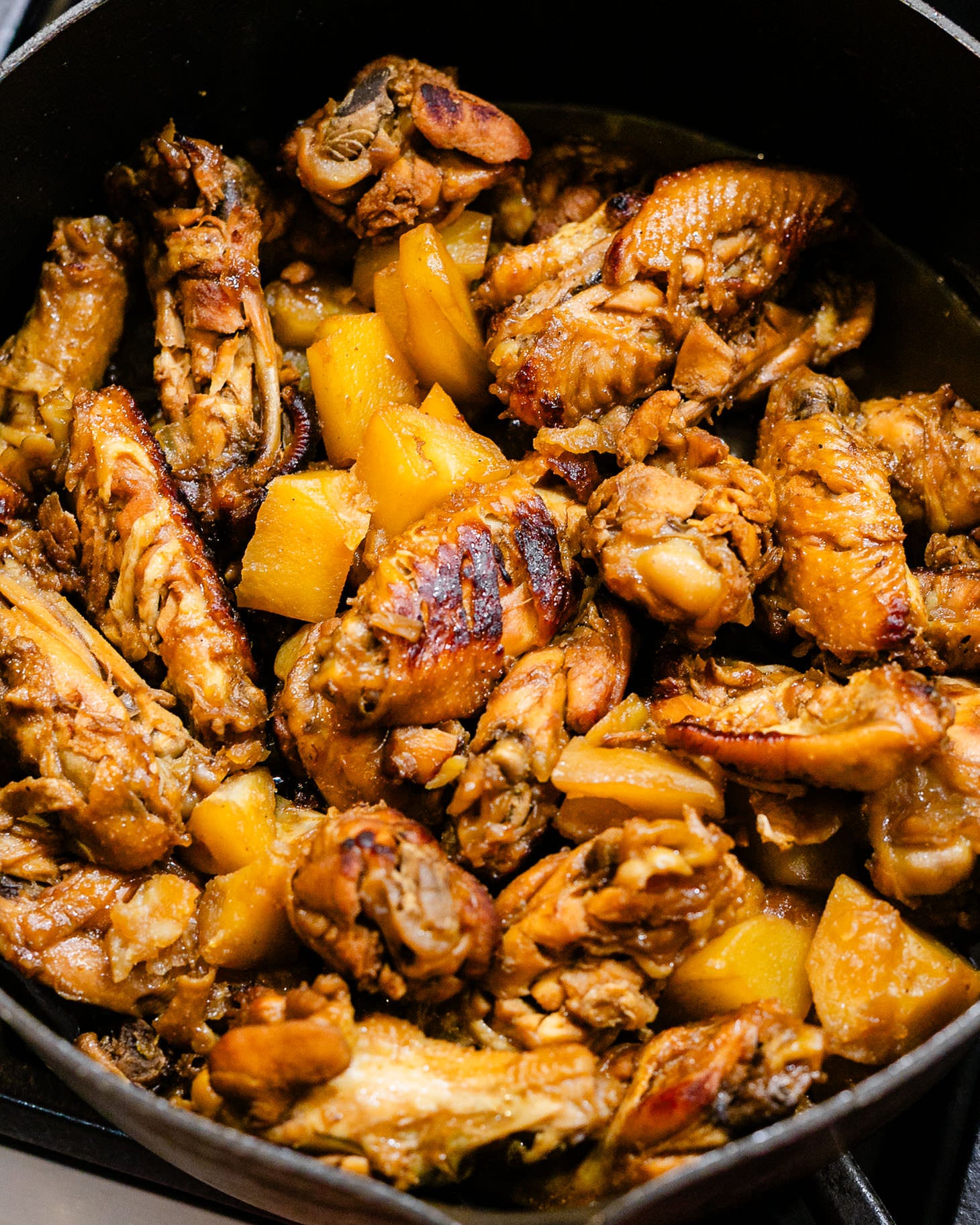 Chinese red braised chicken wings (红烧鸡翅) with potatoes, caramelized and simmered until tender