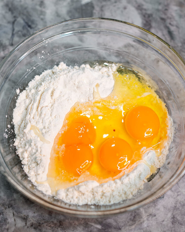 In a large mixing bowl, add the eggs and all-purpose flour.