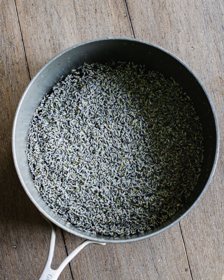 Add the water, dried lavender buds, and sugar to a small saucepan.