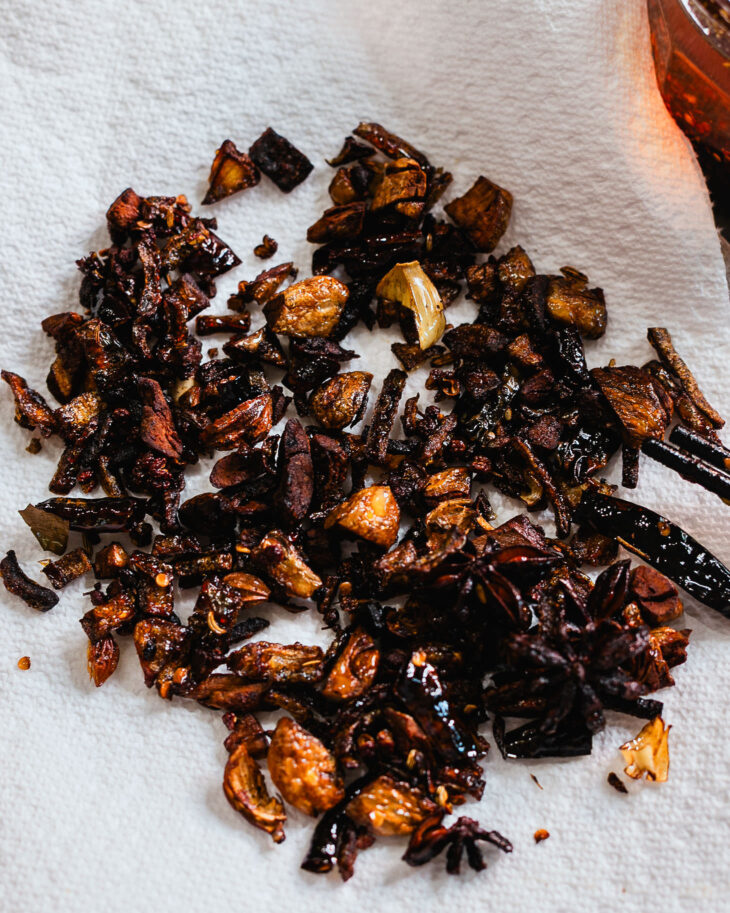 Transfer the crispy garlic and shallots to a paper towel-lined plate so they can crisp up even more as they cool.