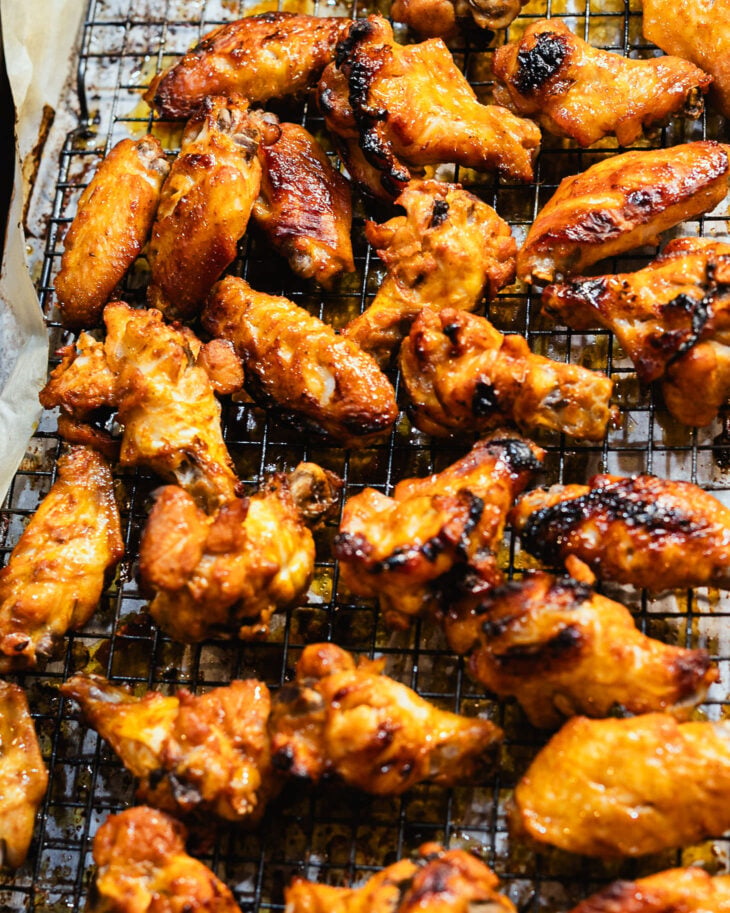 Baked honey soy chicken wings on a wire rack